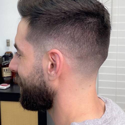 Detailed fade and full beard shaping