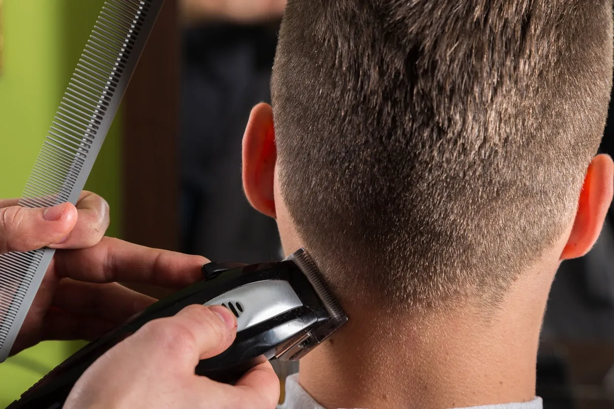 A precision clipper haircut in progress